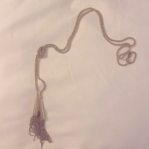 Beautiful gold tassel necklace by Kendra Scott